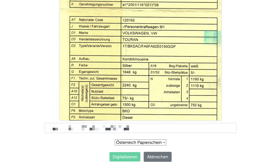 Österreichischer Papier-Zulassungsschein im Scanner, persönliche Daten geschwärzt